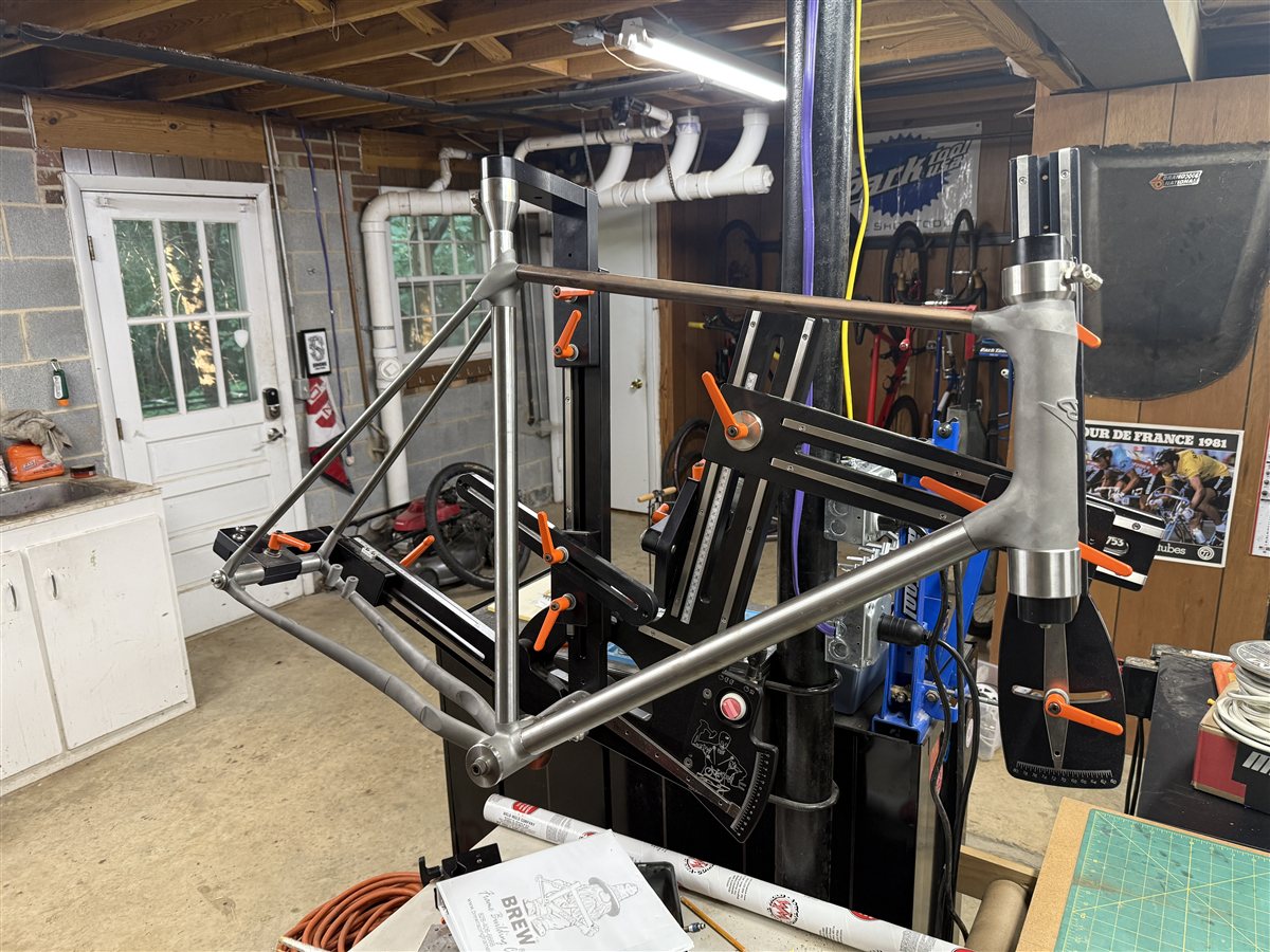 Steel frame tubes clamped and fitted in the jig