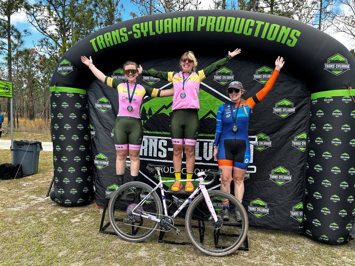Rider on a Big Block Bikes custom frame on the race podium