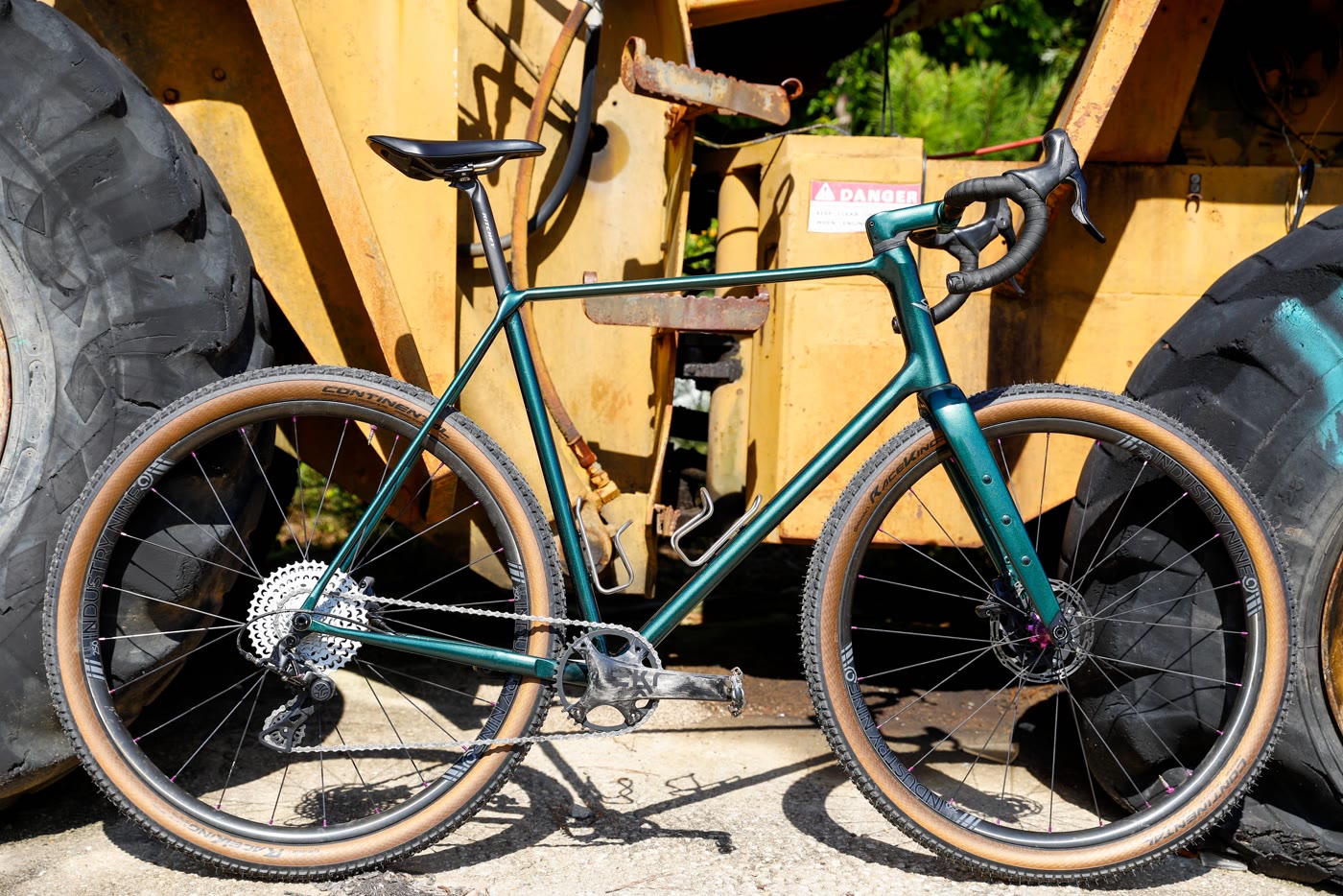 The 401 leaned against a weathered yellow bulldozer