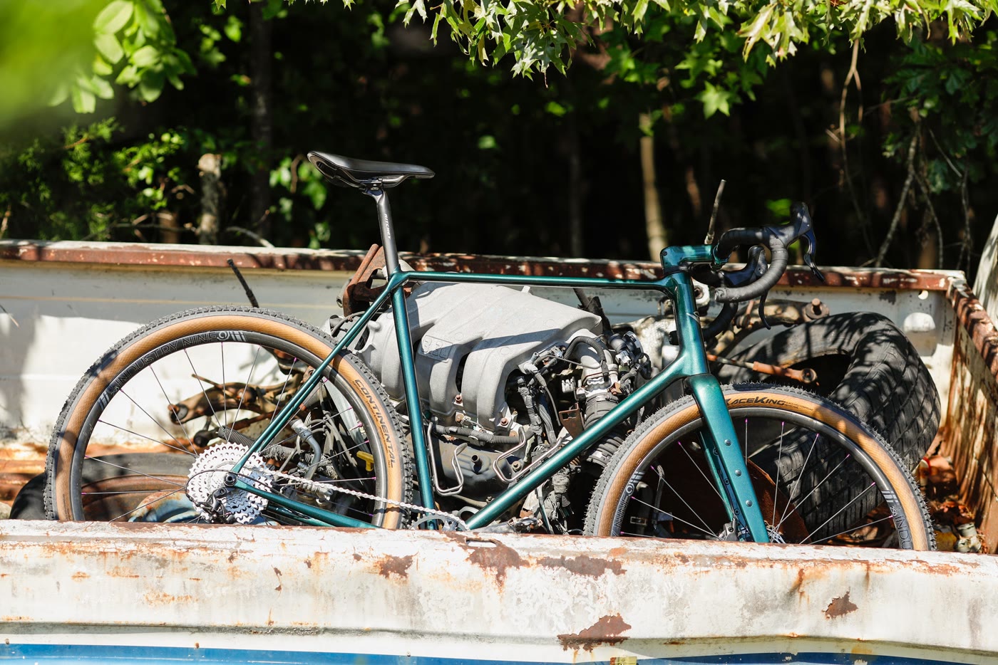 The 401 in the bed of a rusted pickup, engine parts alongside