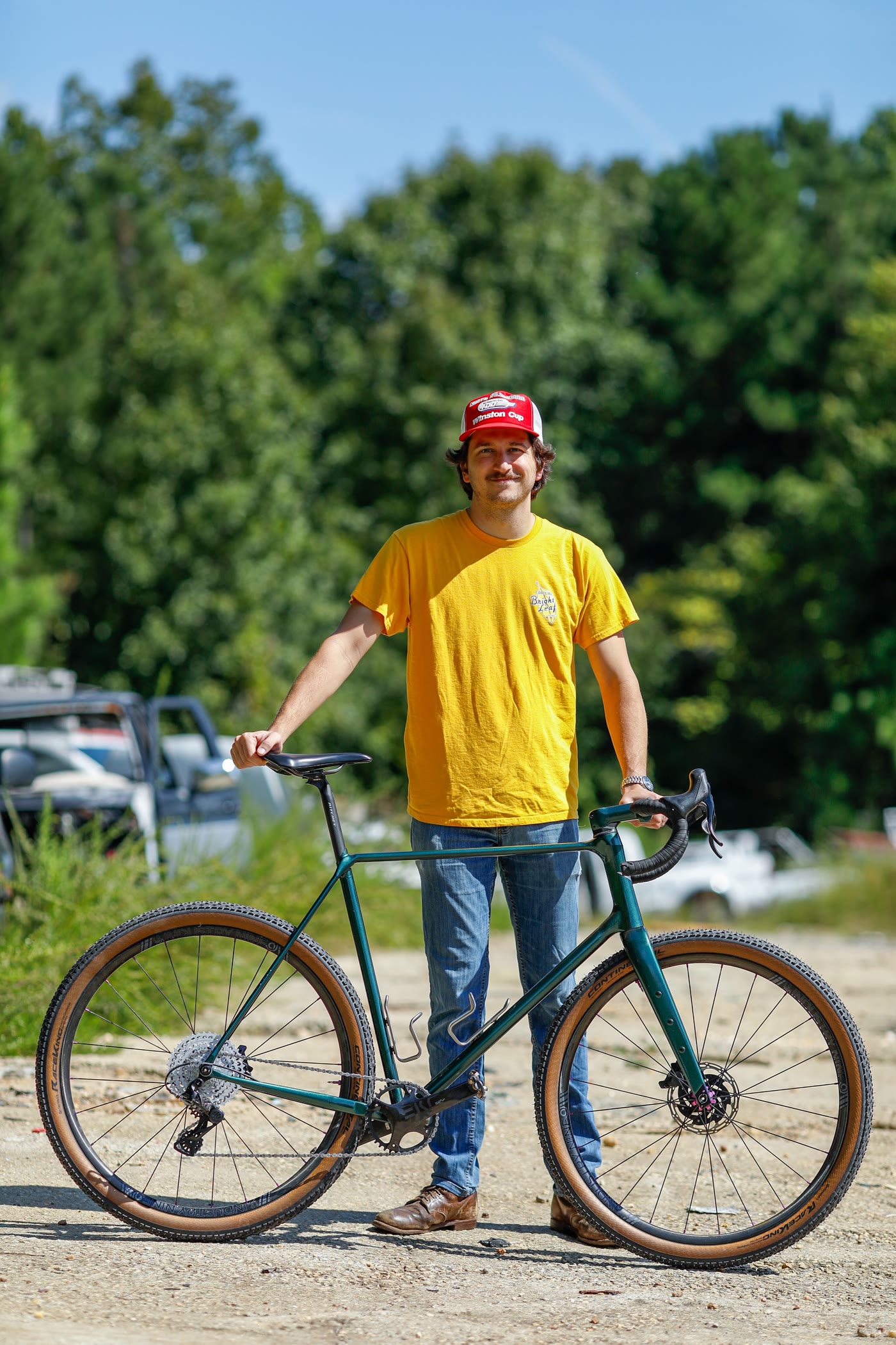 Dustin with the finished 401 — builder portrait