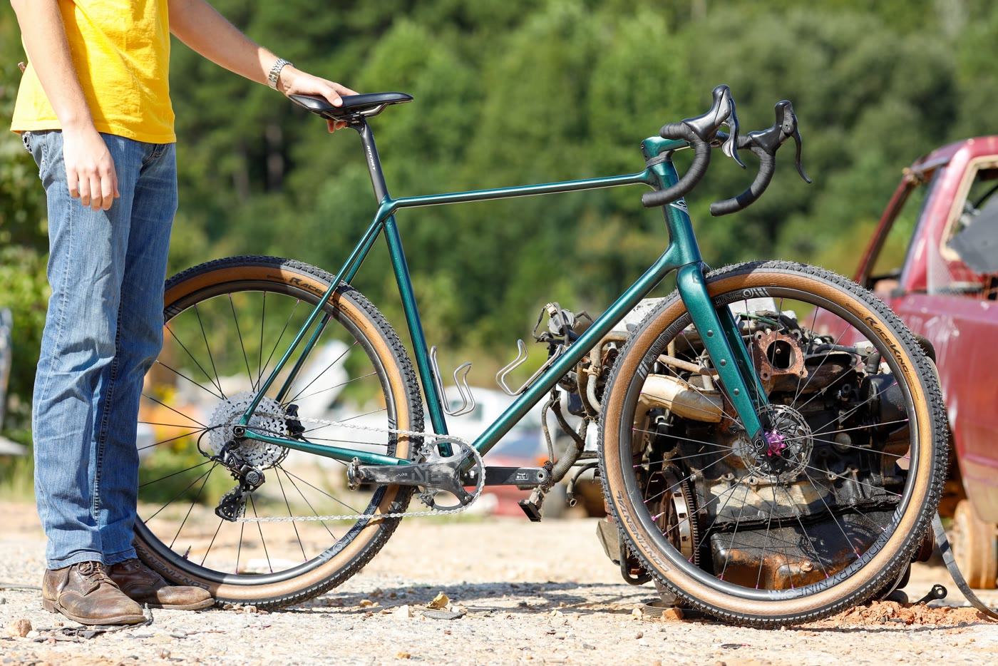 Dustin holding the 401, junked engine block in the background