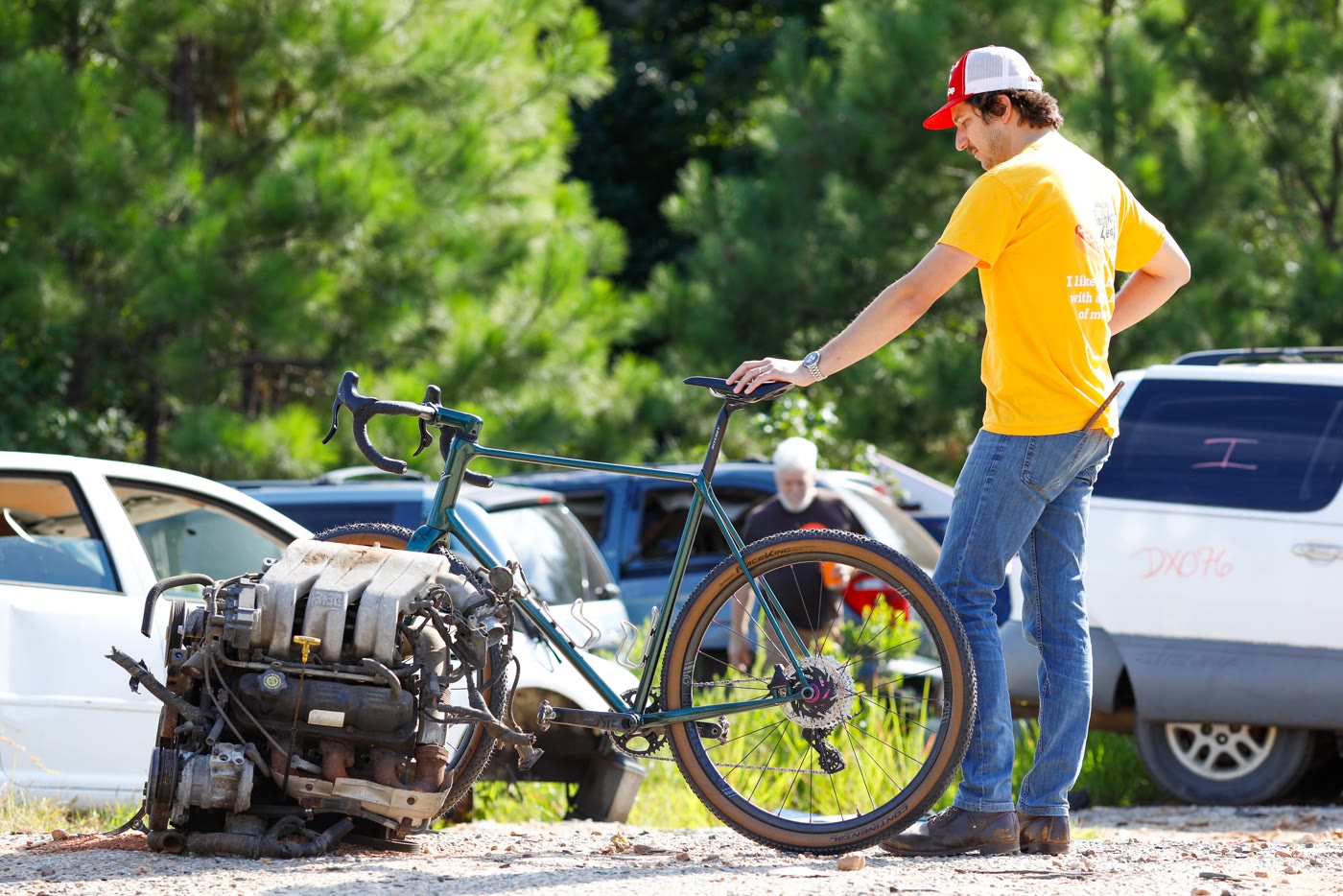 Dustin with the 401 in the junkyard parking lot