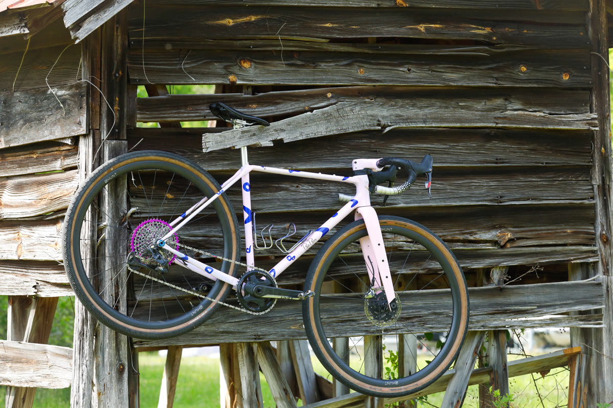 The 401 leaned against weathered barn wall planks