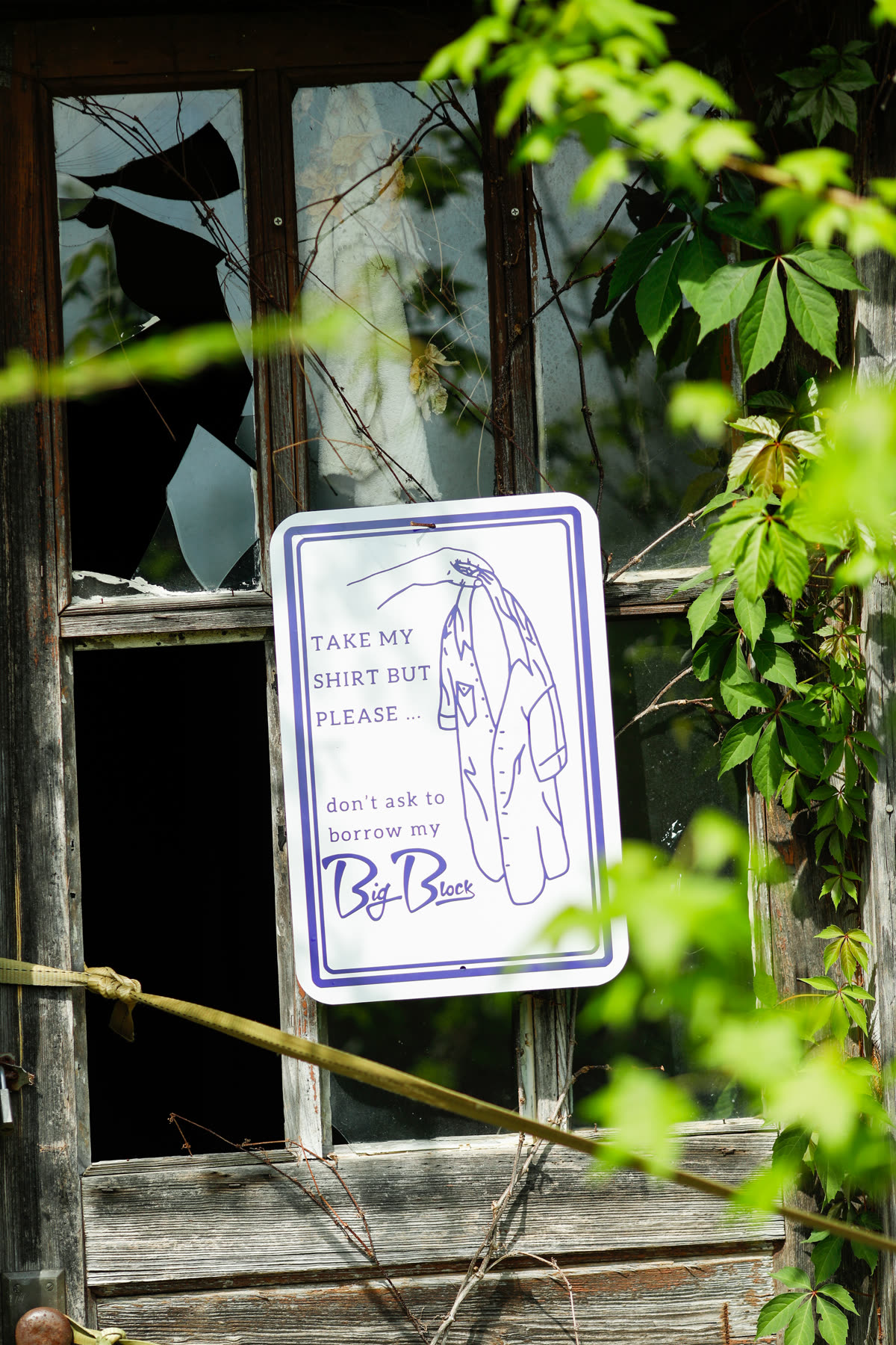 Take my shirt but please don't ask to borrow my Big Block - novelty sign in an old window